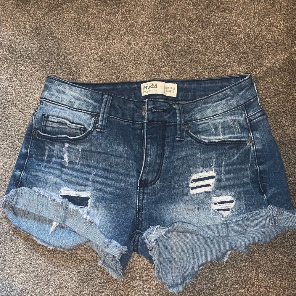 Shortie style blue distressed jean shorts Jr Sz 1